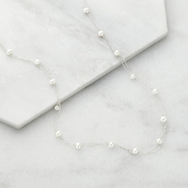 Two layered 15 pearl necklace Silver web